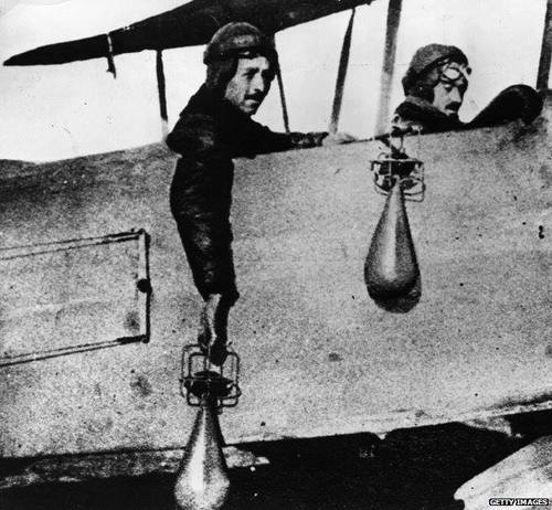 8-pilots-dropping-bombs-by-hand.jpg?w=64